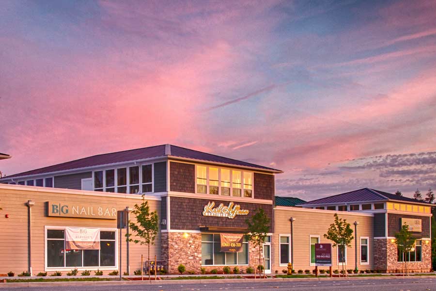 DSide view of building exterior with practice sign at Karl Hoffman Dentistry in Lacey, WA 