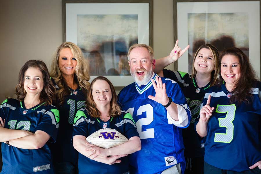 Team in Seattle Seahawks apparel at Karl Hoffman Dentistry in Lacey, WA