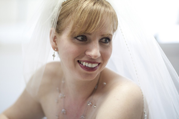 Woman in wedding dress and veil, a patient at Karl Hoffman Dentistry in Lacey, WA