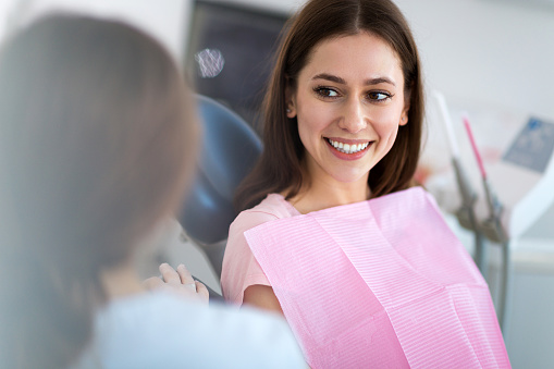 Dental patient looking at dentist at Karl Hoffman Dentistry in Lacey, WA